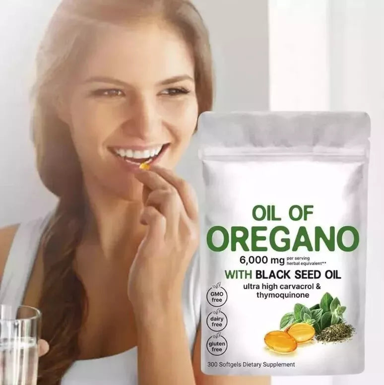 Woman taking Oil of Oregano with Black Seed in softgel form for daily wellness support