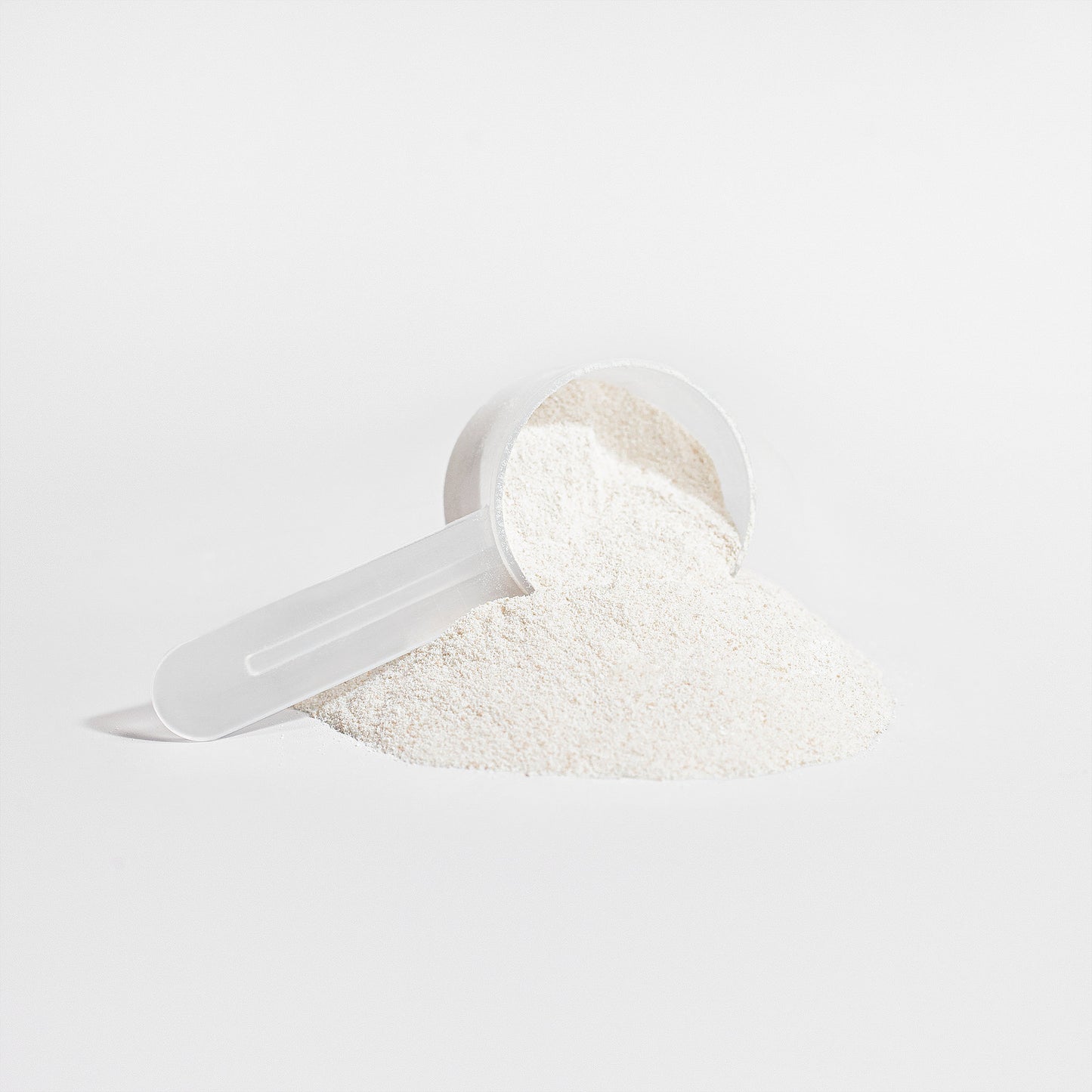 Roksy collagen grass fed peptides powder in a scoop for skin, hair, and nail health