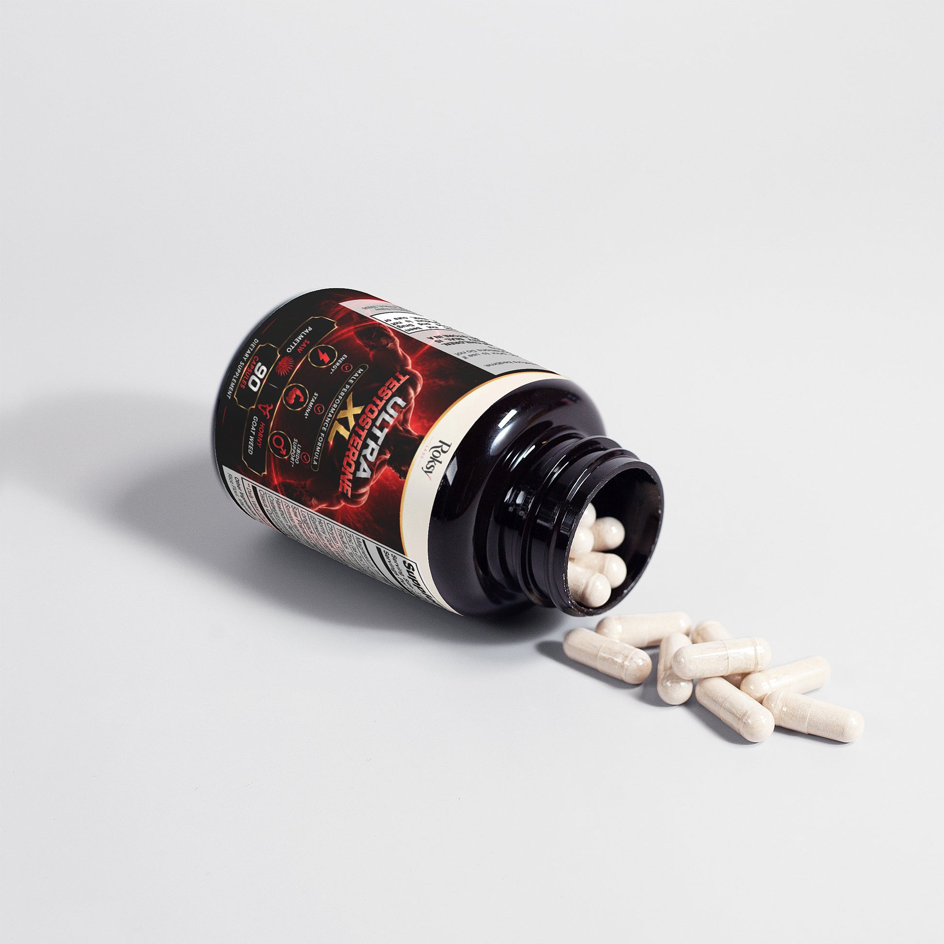 Roksy Ultra Testosterone XL natural testosterone booster bottle with spilled capsules on a light background.